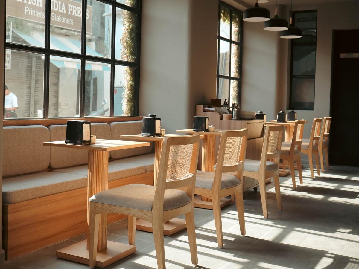 Sunlit indoor seating by big windows